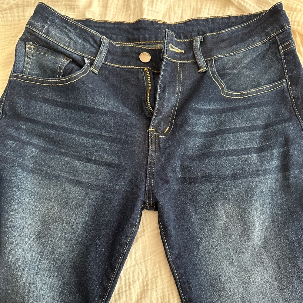 Denim low rise blue jeans flare leg frayed ends size M
Brand new without tags